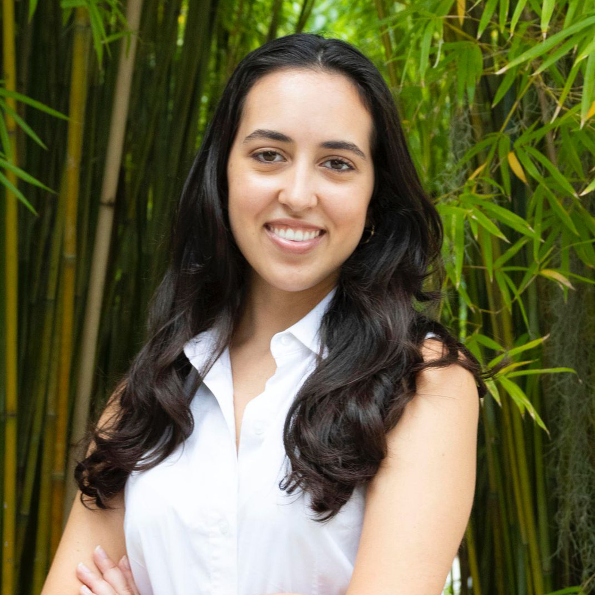 Laura San Juan, producer of Moon Rocks, smiling in a headshot